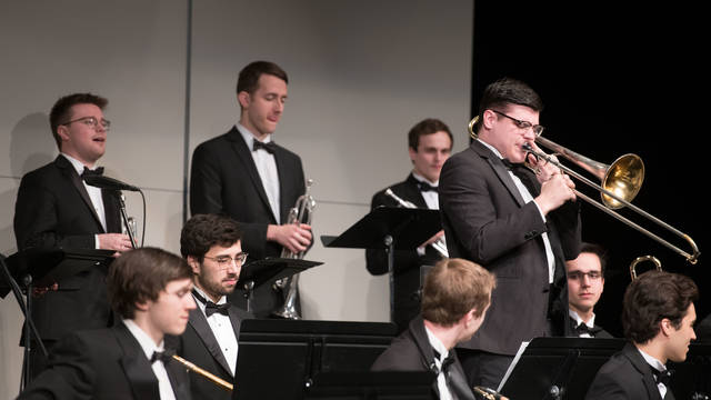 Students playing jazz music at a concert.