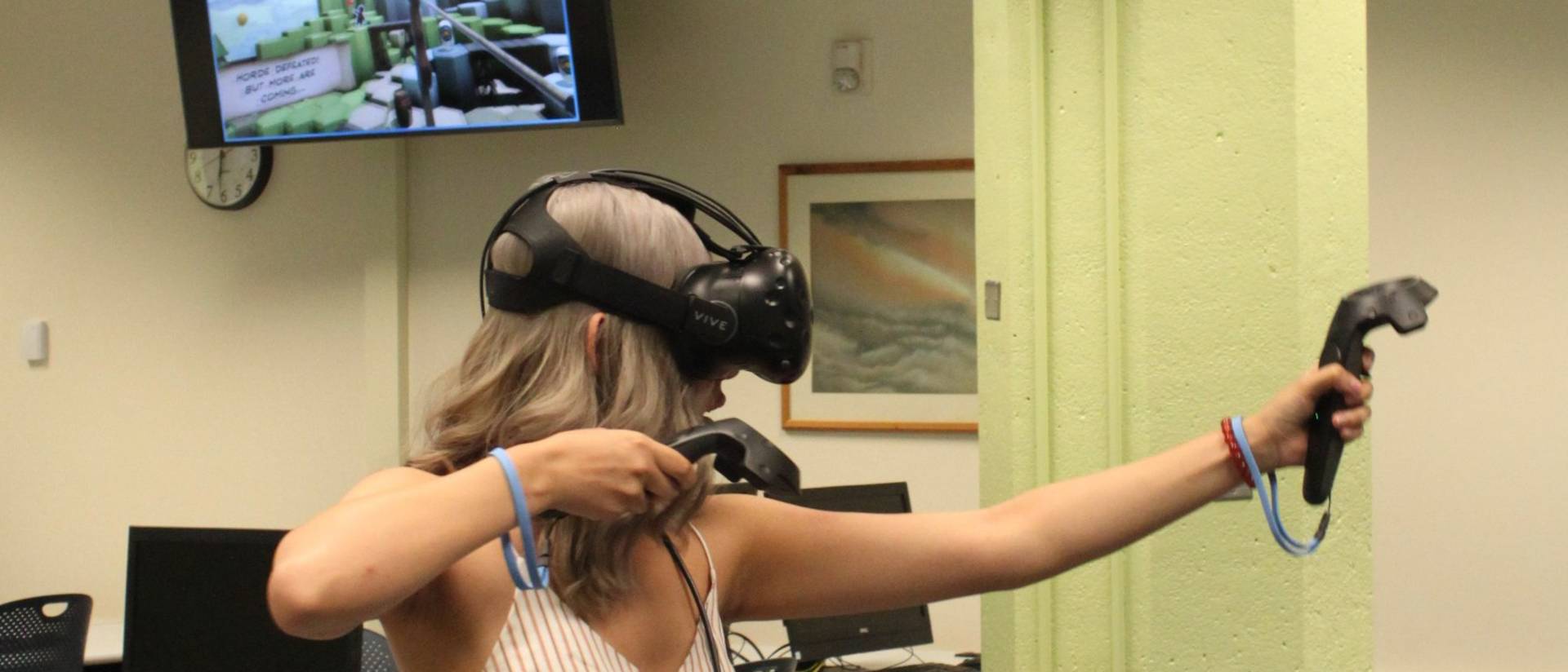 Student trying out Virtual reality goggles