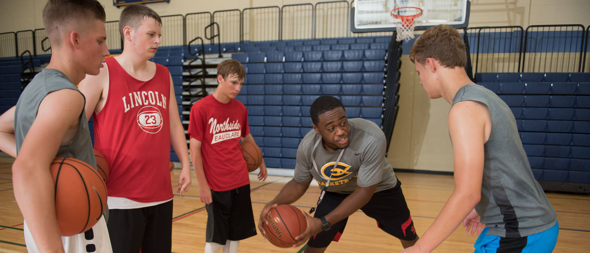 UWEC Boys Basketball Camp Participants Learn Drill