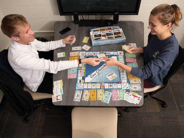 Blugolds play Eau Claire-Opoly, a local version of the popular board game.