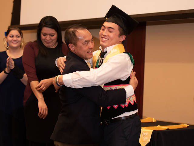 Charles and Justin Vue at 2019 OMA graduation ceremony
