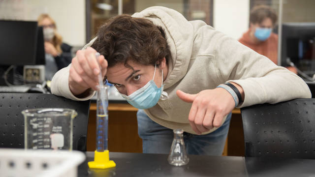 UWEC student working in lab
