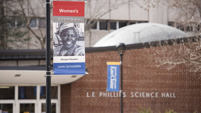 Women's History Month banner outside on campus mall