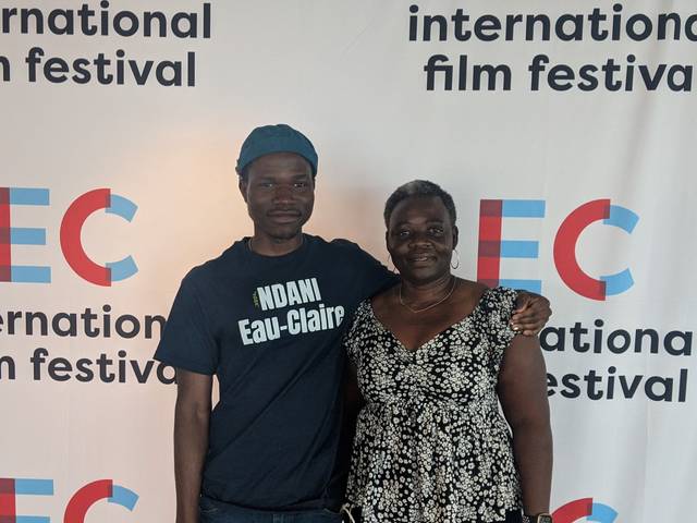 Olu Famule and his mother