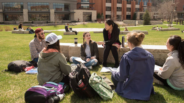 Students in a Chinese language class learning outdoors