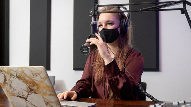 Marketing student recording a podcast