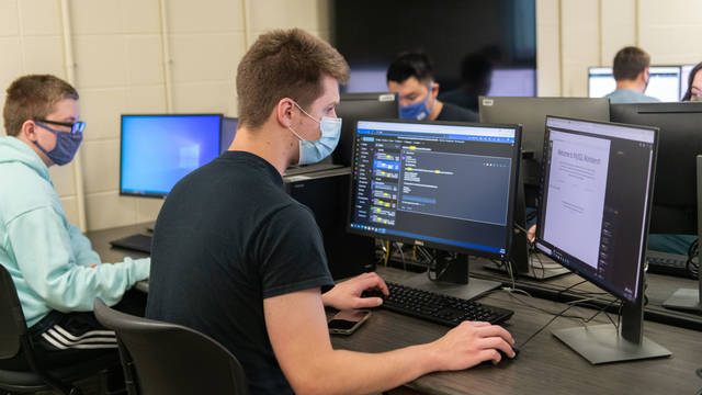 Students in a computer science class