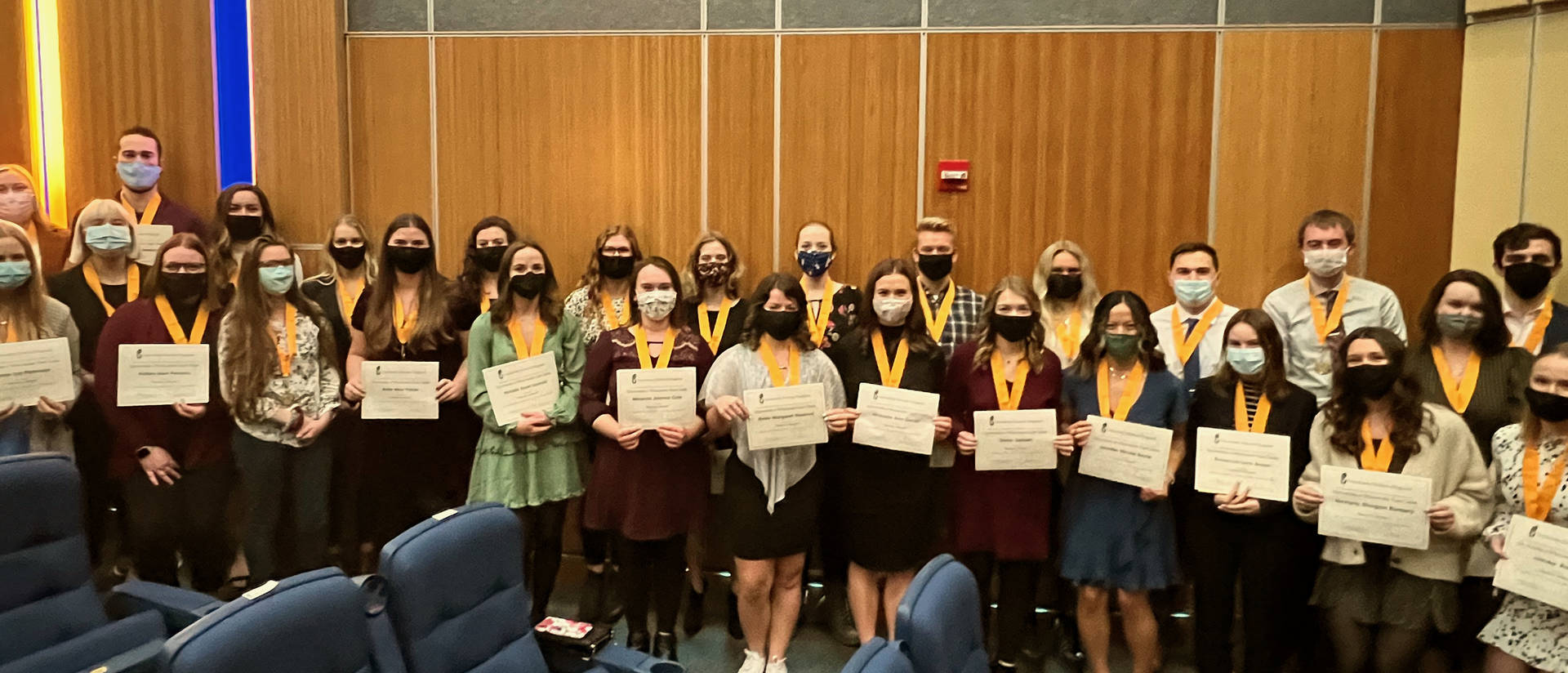 Fall 2021 Honors graduates pose with their certificates