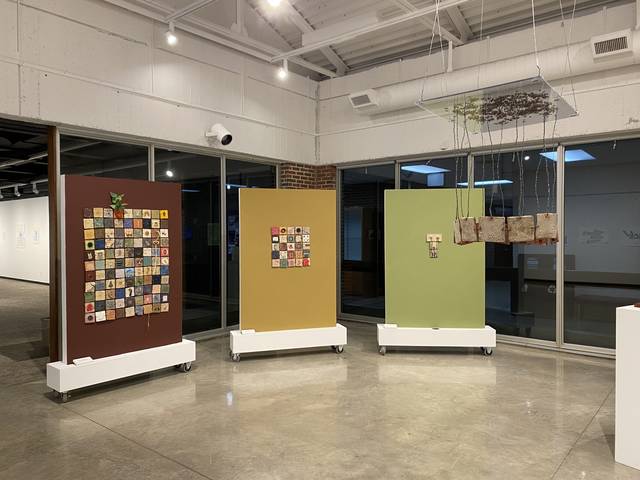 Installation view of Kala Rehberger's ceramic tile projects