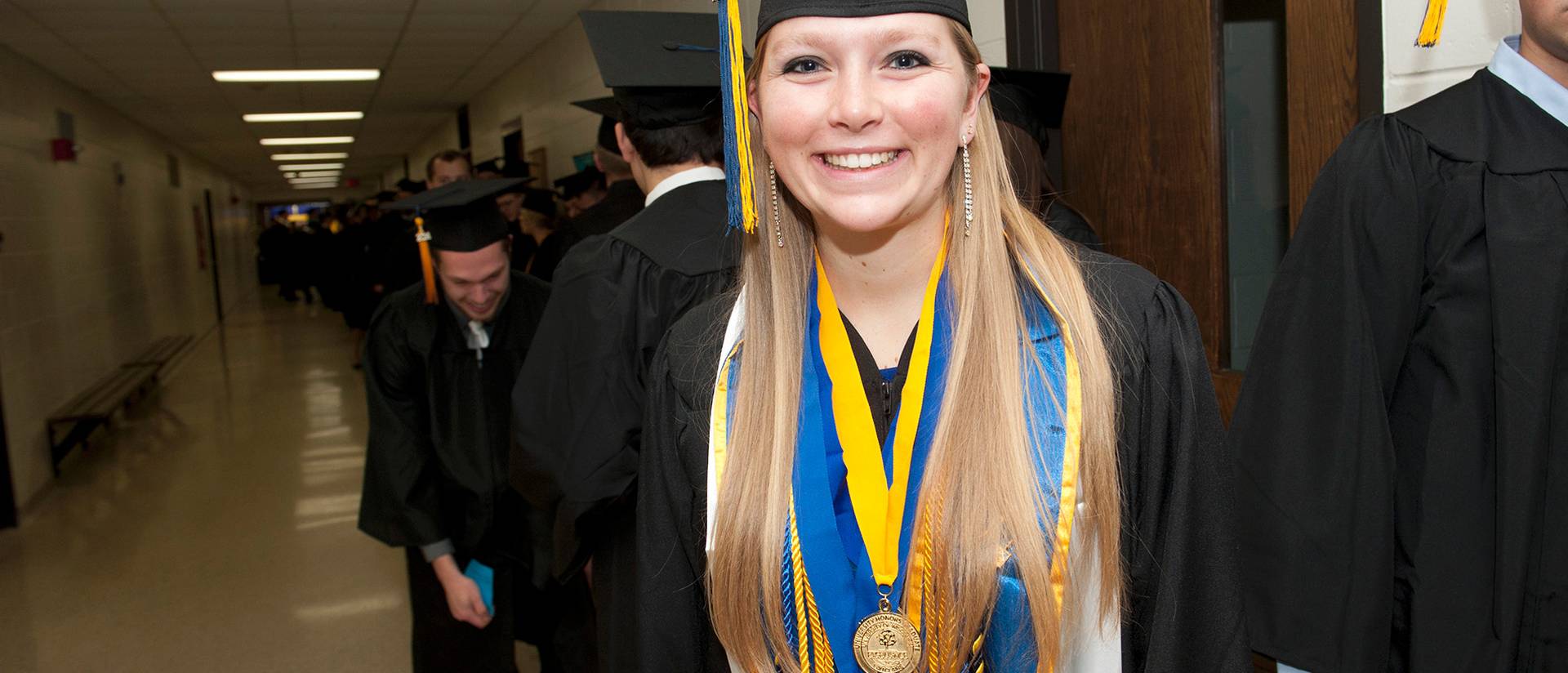 Katelyn Goettl makes history as the first triple honor grad at UW-Eau Claire
