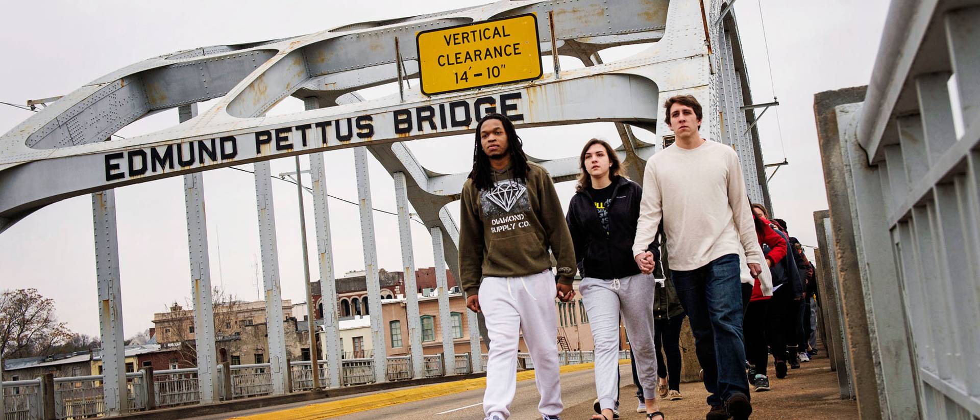 UW-Eau Claire students crossing historic Pettus Bridge in Selma, Alabama