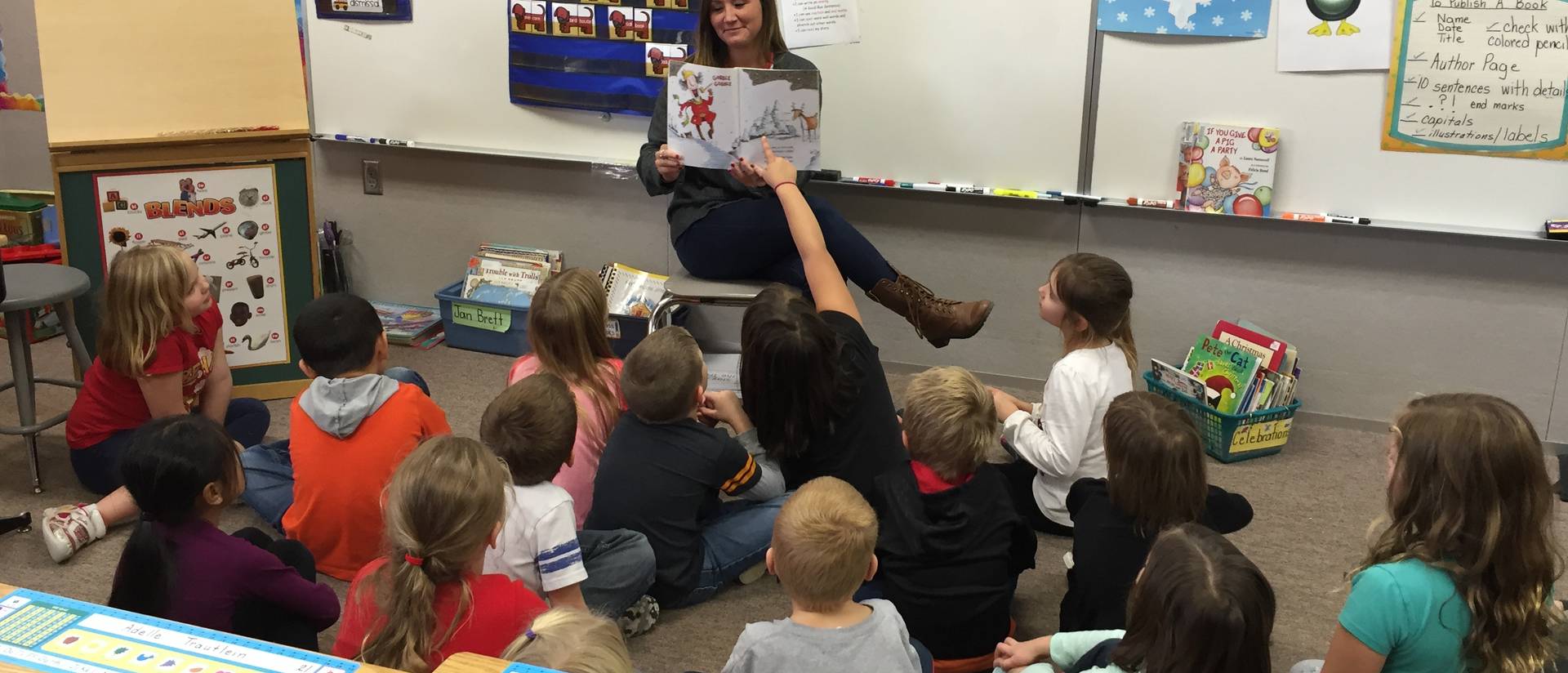 Student Rebecca Lenz reads to class during practicum experience
