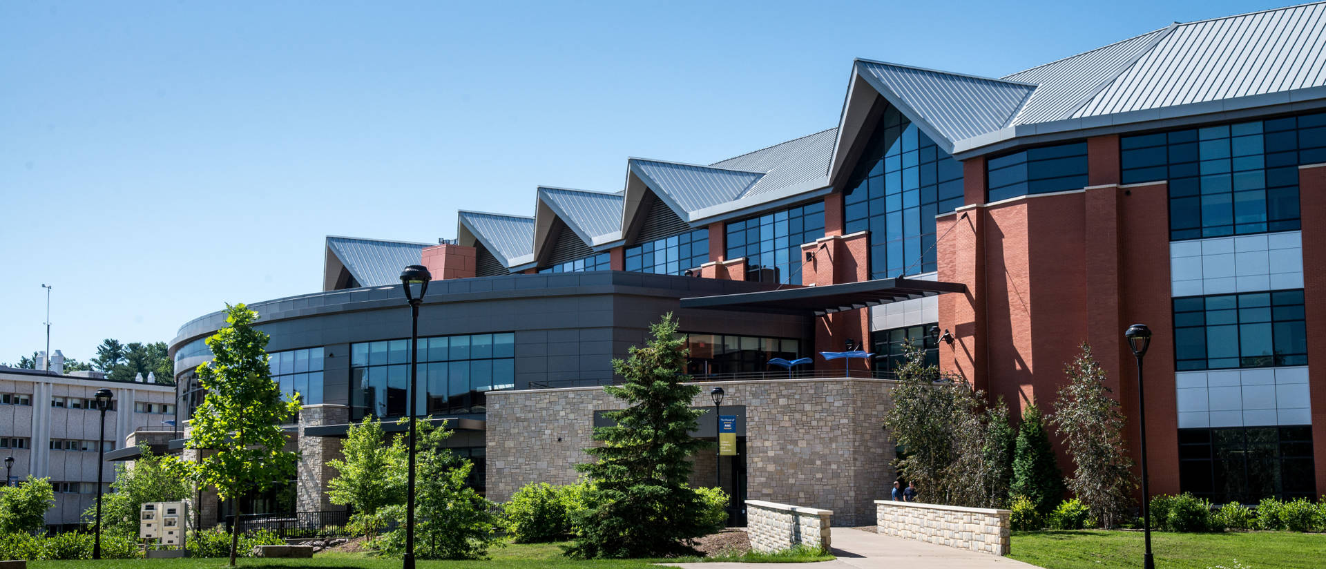 Exterior view of Davies Center in the summer