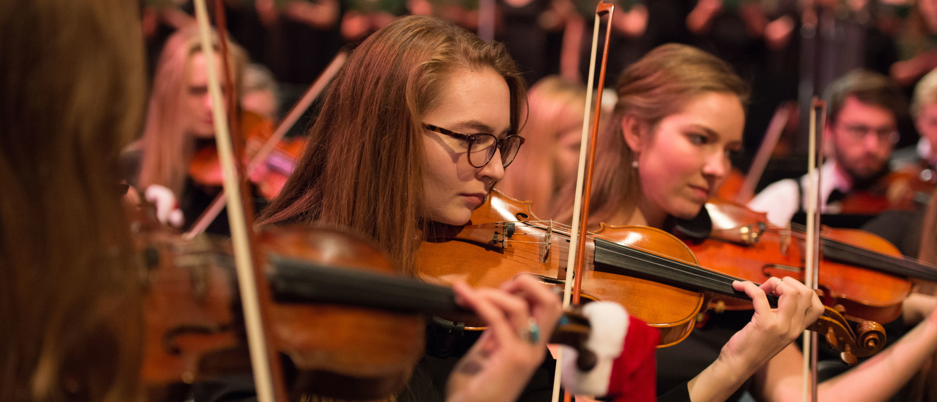 viola players perform with symphony at Holiday Concert 2016