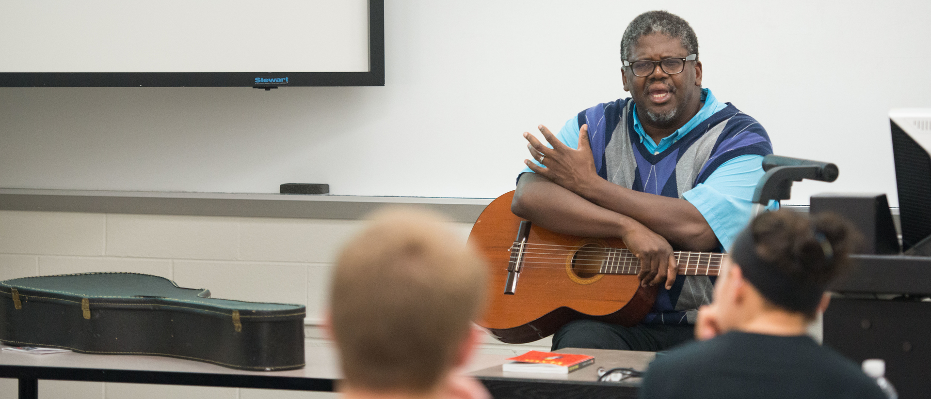 Professor David Jones during a History of Rock and Roll honors class, 2015.