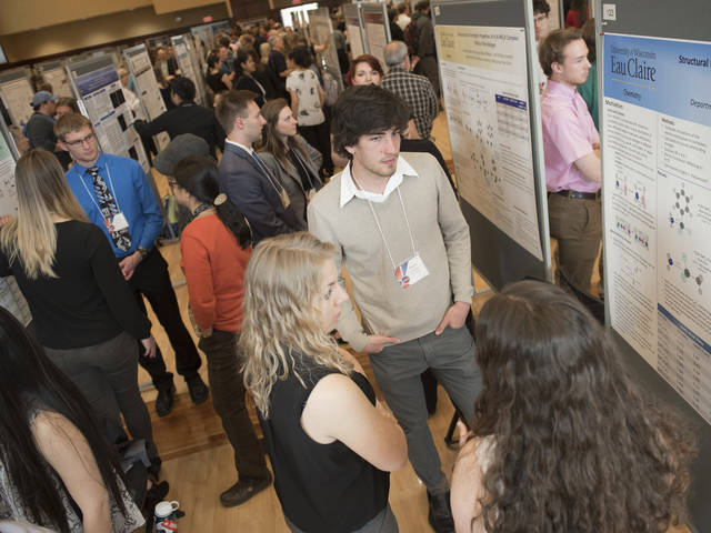 Students with research posters at CERCA