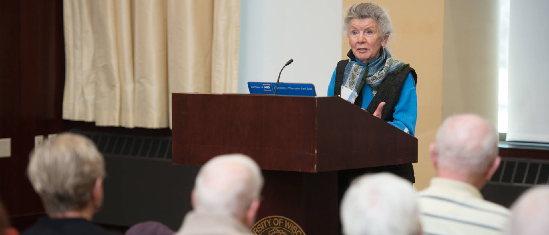 Joan Christopherson Schmidt, donor of the Frederick G. and Joan Christopherson Schmidt Robert Frost Collection to the UW-Eau Claire Foundation, reads during UW-Eau Claire's 2017 Robert Frost Celebration of American Poetry.